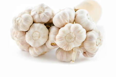 Fresh garlic isolated on white backgroundの写真素材