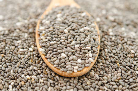Chia seed in wooden spoonの写真素材