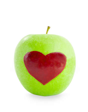 Red apple heart shape in Green apple isolated on white background, save clipping path.の写真素材