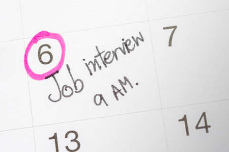Job interview words written on the calendarの写真素材