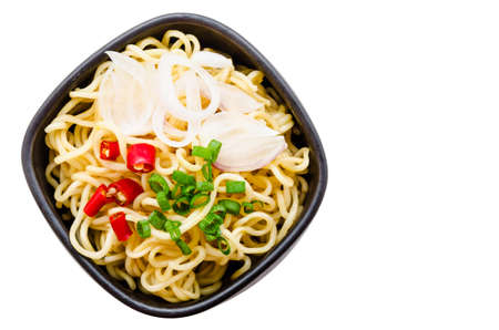 Bowl of instant noodles isolated on white background.の写真素材