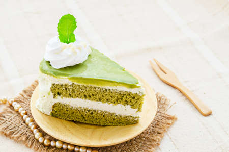 Japanese Matcha Green tea cake on tablecloth.の写真素材