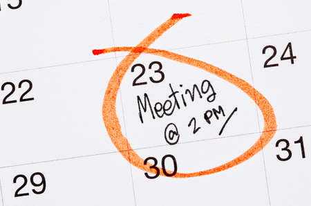 Meeting appointment written in a calendar page