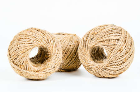 Hemp rope roll on white background