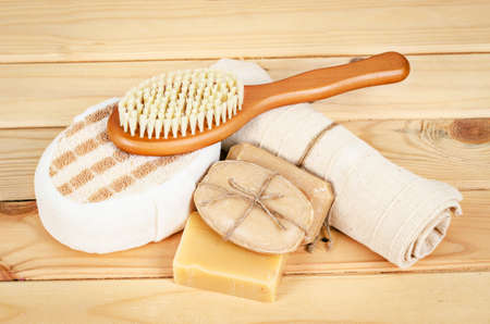 Herbal soap and set spa treatment on wooden bacgkround.の写真素材
