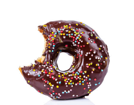 Eaten delicious chocolate donut with Sprinkles Isolated on White Backgroundの写真素材