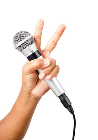 Man hand with microphone, on white background. Saved clipping path.の写真素材