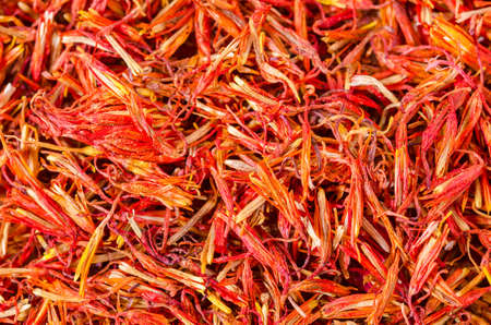 dry safflower herb tea background.の写真素材