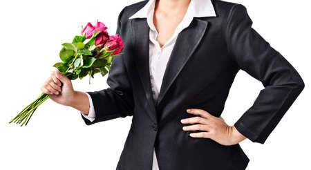 Business woman holding roses isoalted on white background, Clipping path.の写真素材
