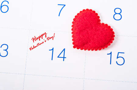 Happy valentine's day with red heart on white calendar page.の写真素材