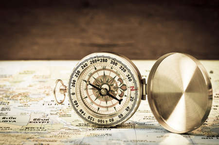 Compass on world map, Tourism and exploration concept.