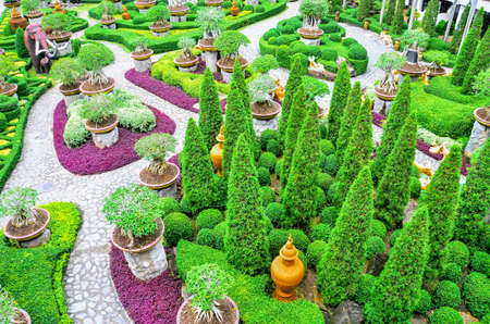 CHONBURI, THAILAND - 4th June 2015: Beautiful garden decoration in Nong Nooch Tropical Botanical Garden. Nong Nooch Tropical Botanical Garden is a 500-acre botanical garden in Chonburi, Thailand.のeditorial素材