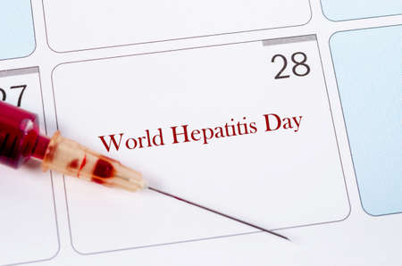 28 July calendar page and sample blood for hepatitis test. World hepatitis day concept.の写真素材
