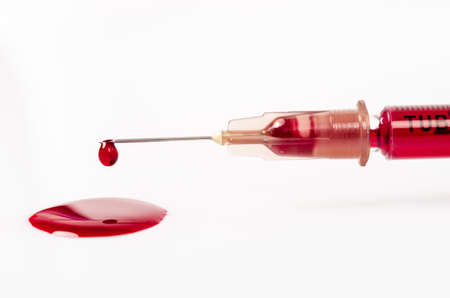 Blood with a syringe (safety) isolated on white background.