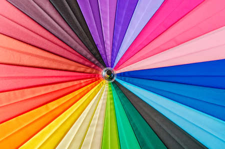 Close up rainbow umbrella as background.の写真素材