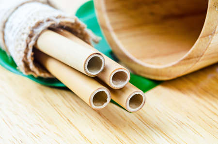 Ecological bamboo straws tube for drinking water just say "NO" to plastic. Eco friendly concept.の写真素材