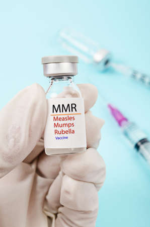 MMR vaccine for Measles, Mumps, and Rubella as outbreaks concept.の写真素材