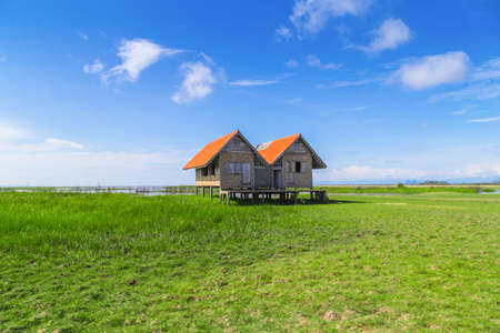 Twin old house on wetland at Talay Noi lake at Phatthalung,southern of Thailand.の写真素材
