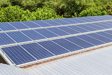 Solar photovoltaic panels on roof house. Alternative power energy concept.
