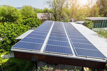 Solar photovoltaic panels on roof house. Alternative power energy concept.