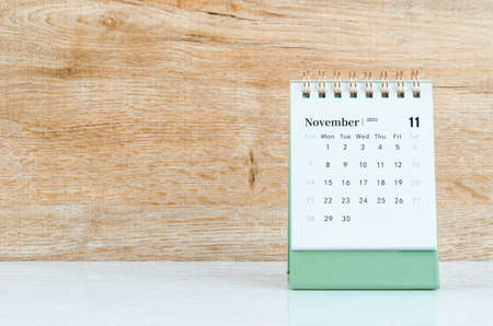 November Calendar 2021 on wooden table background.の写真素材