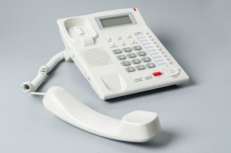 White IP Phone office on grey background.の写真素材