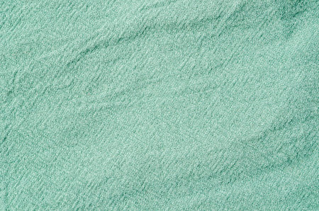 Green cloth texture background for design workの写真素材