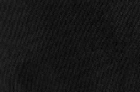 Black fabric textured as background.