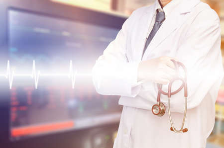 Medicine doctor with stethoscope in modern virtual screen interface, medical technology network concept at the hospital background.の写真素材