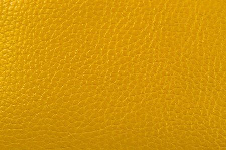 Golden leatherette texture as background.の写真素材
