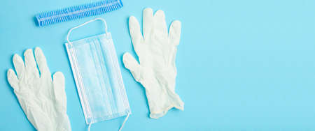 The Medical gear protecting against transmittable diseases, on blue backgroundの写真素材