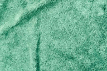 Green Microfiber Towel textured as backgroundの写真素材