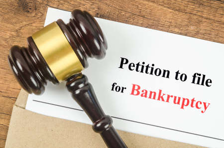 The Wooden Gavel and bankruptcy file documents. Law Concepts.の写真素材