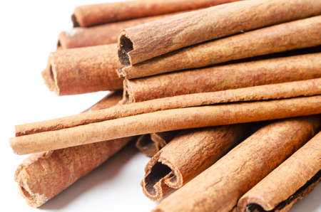 The Group of cinnamon sticks on white backgroundの写真素材