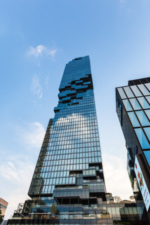 BANGKOK, THAILAND - APRIL 30, 2022: Mahanakorn sky scraper the higher modern building landmark with Sathorn Square commercial office at Sathorn bussiness center of Bangkok cityのeditorial素材