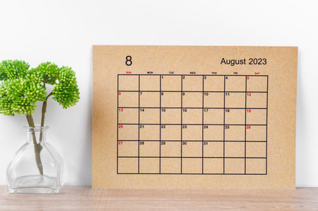August 2023 Monthly calendar for 2023 year on wooden table.