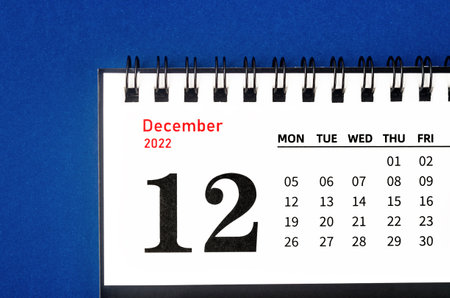 December 2022 Monthly desk calendar for 2022 year on blue background.の写真素材