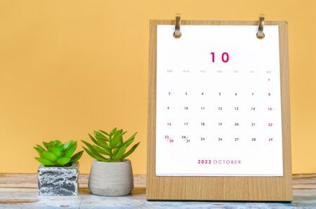 October 2022 Monthly desk calendar for 2022 year on yellow background.の写真素材