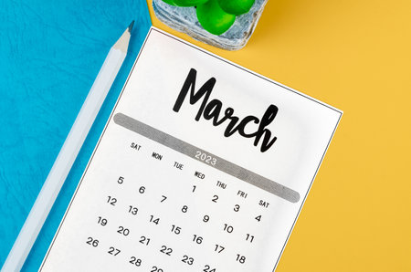 March 2023 Monthly calendar for 2023 year with pencil on beautiful background.の写真素材