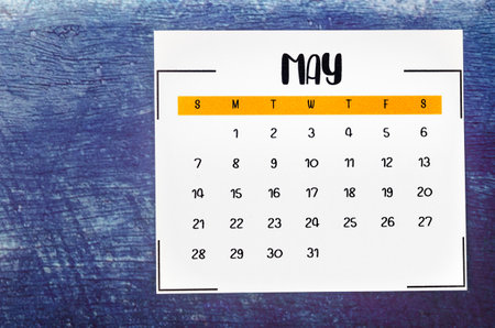 May 2023 Monthly calendar for 2023 year on old blue wooden background.の写真素材