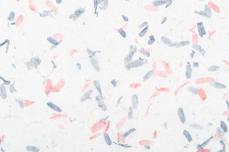 Handmade recycled flower and leaf paper or Mulberry paper texture as background.