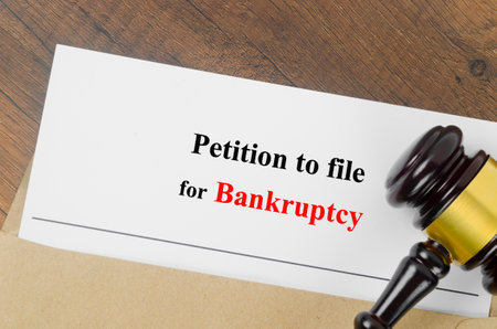 Bankruptcy document with wooden gavel, Business concept.の写真素材