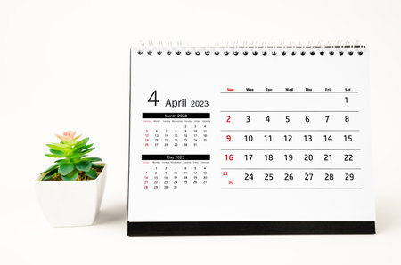 April 2023 Monthly desk calendar for 2023 year with plant pot isolated on white background.の写真素材