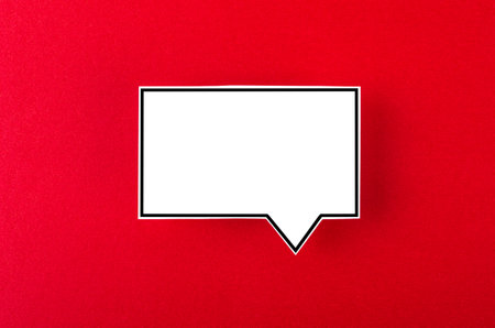 Speech bubble with copy space communication talking speaking concepts on red background.の写真素材