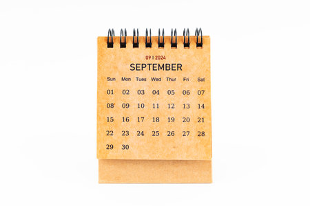 Brown mini desk calendar for September 2024 isolated on white background.の写真素材
