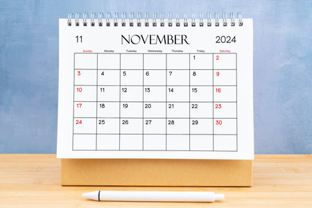 November 2024, Monthly desk calendar for 2024 year on wooden table.の写真素材