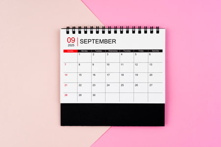 September 2025 desk calendar on pink color background. Page of annual monthly calendar for your plan.の写真素材