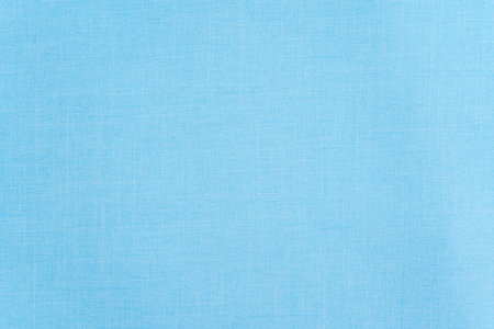 Industrial style light blue cotton fabric texture useful as a background.の写真素材