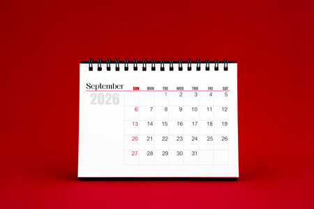 September 2026 Blank desk calendar on red background.の写真素材