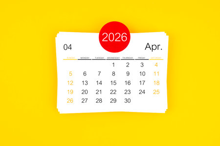 April 2026 card calendar on yellow background.の写真素材